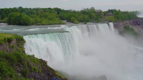 A video of the American - Canadian waterfalls Niagara Falls on a cloudy day. beautiful view of the