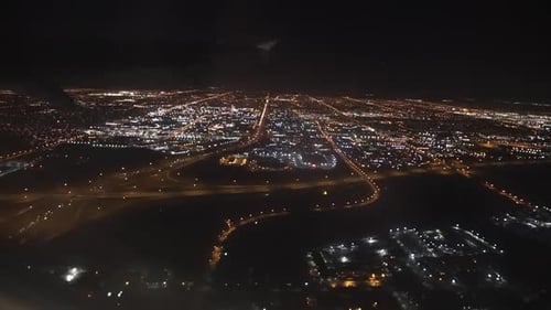 non - descript looking out plane window at night