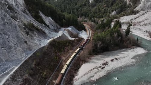 Aerial view of train and mountains, Switzerland.