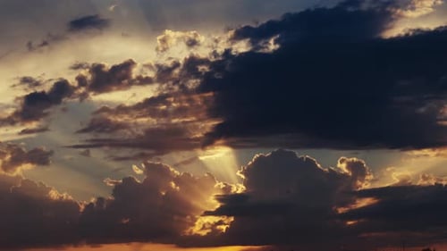 Timelapse Dramatic Sunset Sky with Radiant Sunbeams and Clouds