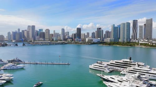 USA Travel Destination Miami Skyline with Ocean Cruise Liner Departing From Port