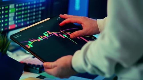 Cryptocurrency market analysis tablet trading chart