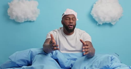 Frustrated african american football fan reacts to losing game in his home bedroom