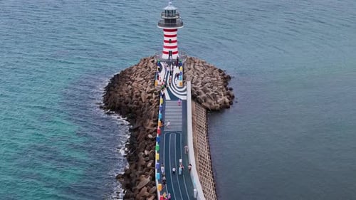 Aerial View of The Picturesque Lighthouse by The Coastline