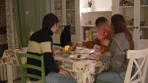 A Cozy Dinner Gathering Among Close Friends A Perfect Evening of Joy and Togetherness