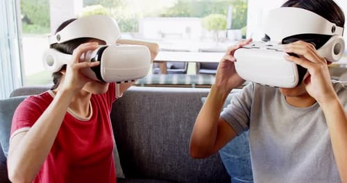 Young Adults Experiencing Virtual Reality with Headsets