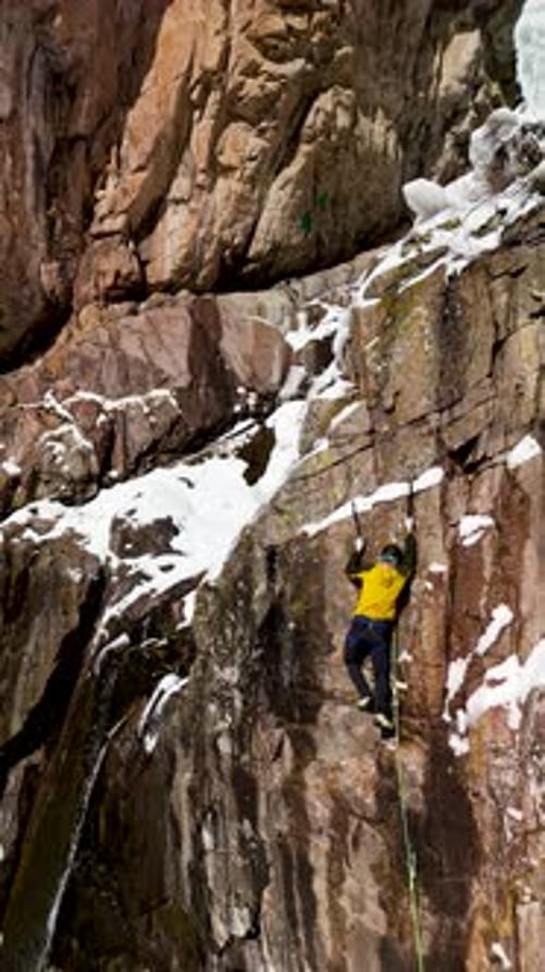 Mountaineer Climbing at Big Glacier Wall