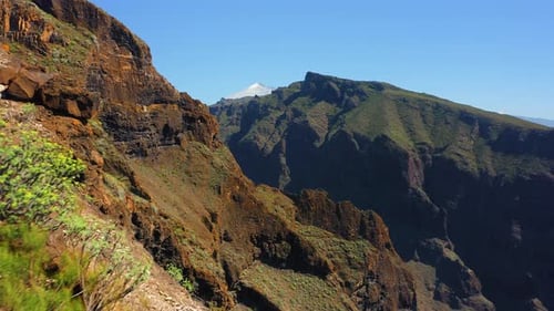 Aerial Flying Over Rocky Canyon Cliff