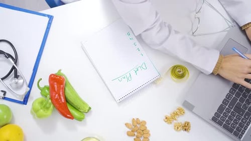 Dietitian preparing diet plan.