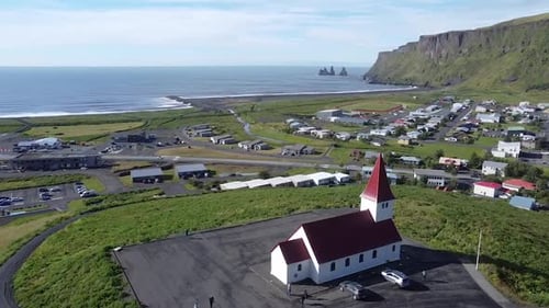 The iconic church in Vík í Mýrdal from drone perspective