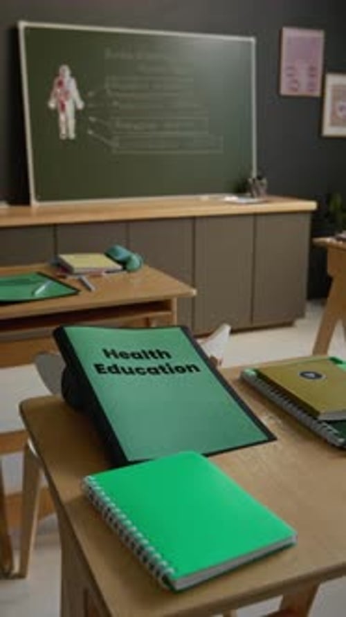 Health Education Textbook on Student Desk in High School Classroom