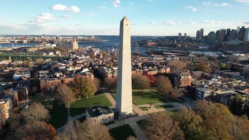 Aerial View of Bunker Hill Monument, Boston, Massachusetts USA. Granite Obelisk and Cityscape in Bac