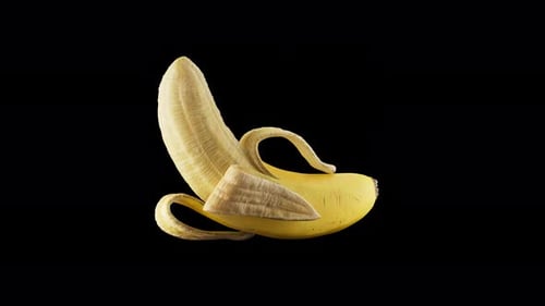 Animação 3D de uma banana girando em torno de seu eixo. Canal Alfa.