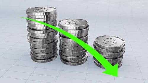 A Pile Of Usd Silver Coins With Prices Decrease