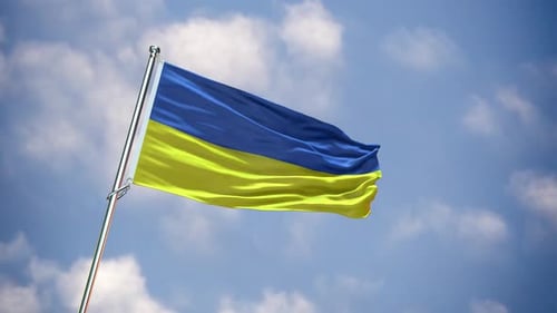 Waving Ukrainian Flag with Blue Sky Background
