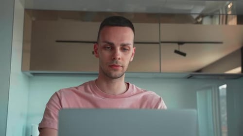 Close Up Focused Businessman Working on Laptop Computer in Home Office Portrait of Male Professional