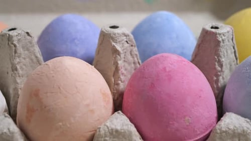 Happy Easter, colorful eggs on yellow background. Close-up of the slider.
