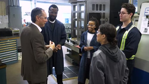 Manager Meeting with Talking to Workers in Manufacturing Plant 10 Seconds or Greater
