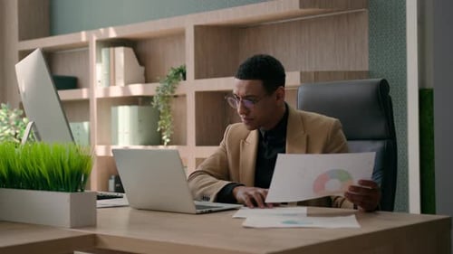African American Man Entrepreneur Office Manager Guy Male Businessman Working at Desk with Laptop