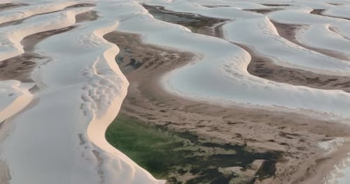 Aerial View of Lençóis Maranhenses, Brazil, Capturing Vast Sand Dunes and Water Lagoons