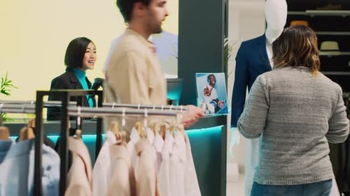 African American Client Trying to Find Fitting Room in Store