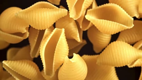 Super Slow Motion Flying Dry Conchiglie Pasta Filmed on a Highspeed Camera at 1000 Fps