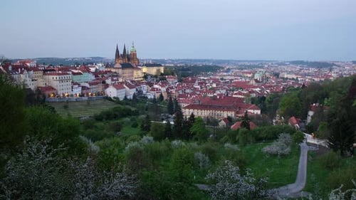 Day to night timelapse in Prague, Czech Republic as seen from Strahov gardens with a view of Prague