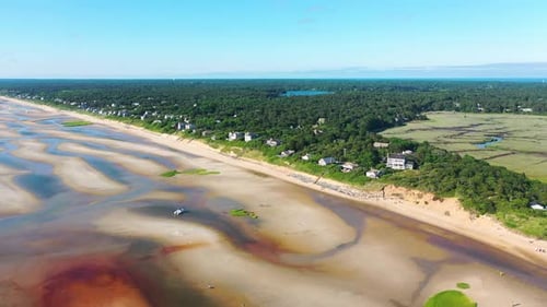 Cape Cod Bay Aerial Drone Footage of Bay Side Beach at Low Tide and Beach Houses with Sand Dunes and