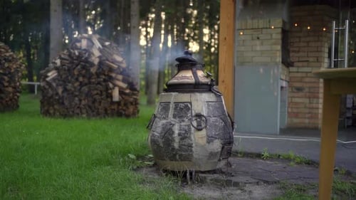 Smoking Tandoor Oven Outdoors in Nature Setting