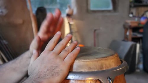 Man Hands Playing the Drum.