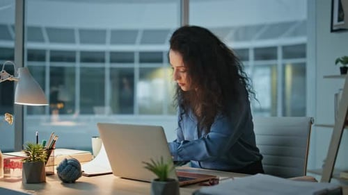 Corporate Manager Analysing Documents at Desk Busy Woman Working Evening Office