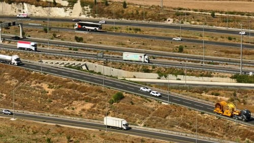 Highway traffic on multiple highways roads with traffic on all roads, Aerial footage