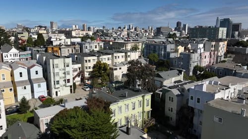 Low Flight Above Apartment Buildings in Urban Borough in Metropolis on Sunny Day