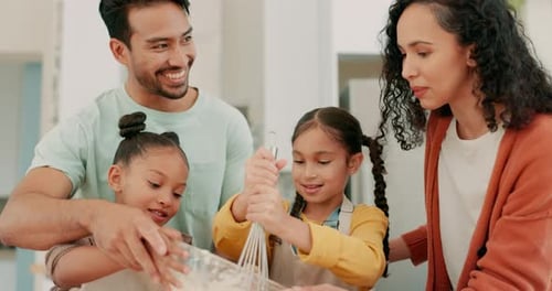 Happy Family Baking Together in a Kitchen