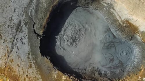 Hot boiling sulphur pit viewed from above in Hverir, Iceland
