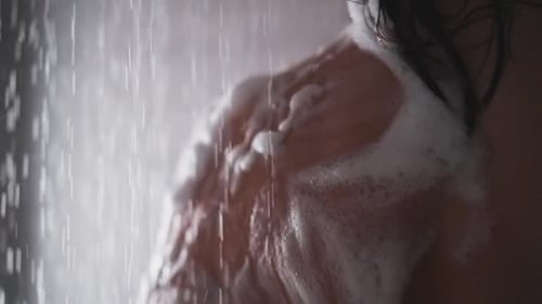 Woman Taking Shower Washing Shoulder and Hair