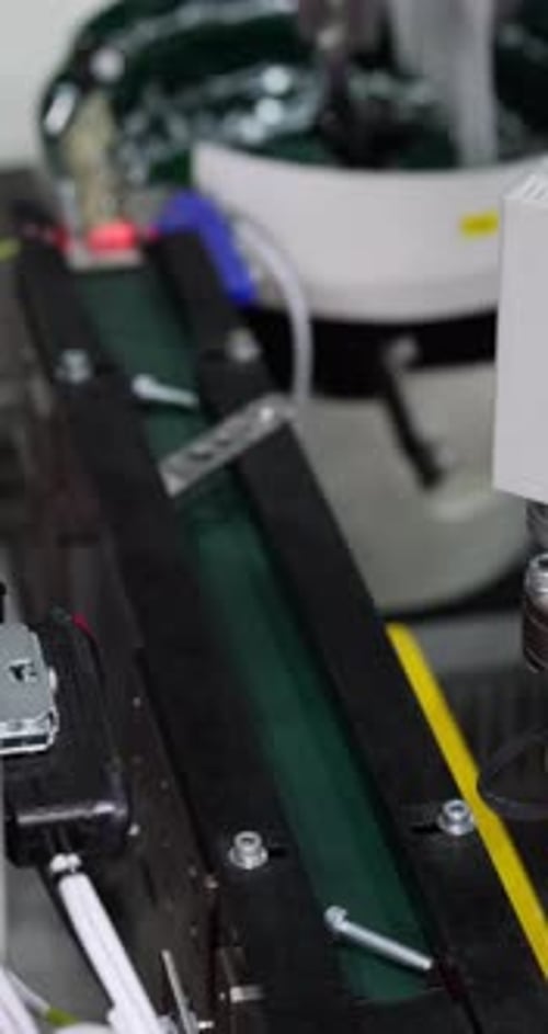 Industrial Sensor Inspecting Items on Automated Production Line System