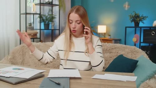 Woman Working From Home on Financials