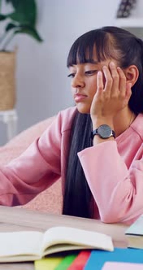 Bored, student or girl with studying in home for education, academic assignment or fatigue for task