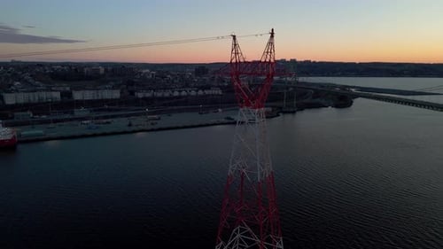 High Voltage Power Lines at Sunsethigh Voltage Electric Transmission Tower