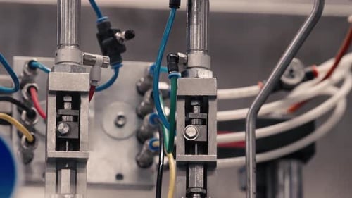 Close up video of a fragrance bottling machine