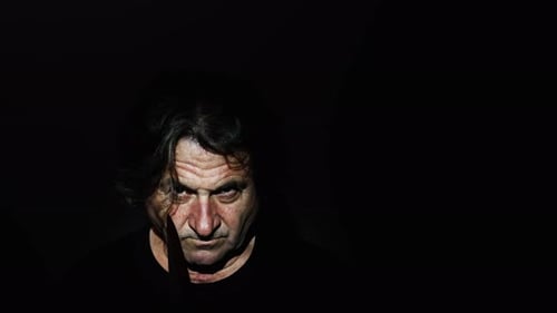 Menacing Man Holding a Bloody Knife