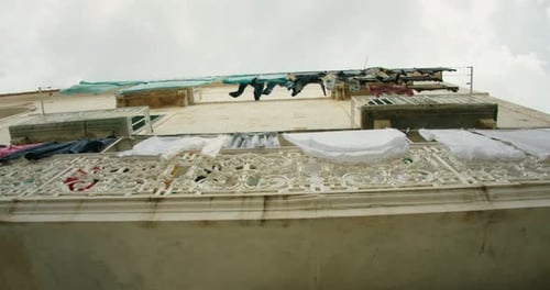 Upward View of Laundry Hanging From Balconies on a Residential Building in Amalfi Coast Italy