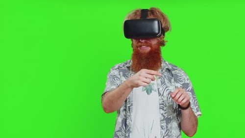Man Using Virtual Reality Headset on Green Screen
