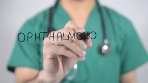 Doctor Writes Ophthalmologist on Clear Surface