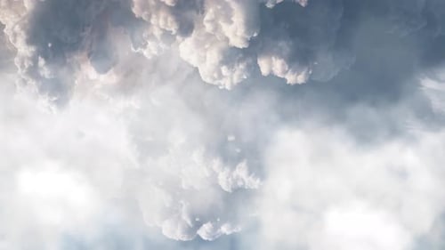 view of cumulonimbus clouds covering the dark sky.