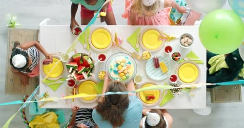 Kids Celebrating at Cheerful Birthday Party, Overhead View