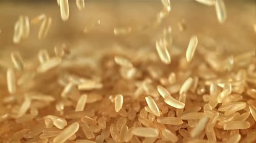 Rice Falls on the Table Filmed on a Highspeed Camera at 1000 Fps