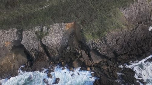 Reverse drone flight from the Cantabrian cliffs towards the sea