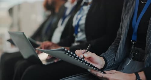 Business People Working at Conference